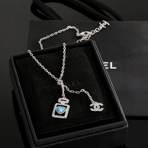 CHANEL Silver Necklace with Turquoise Detail